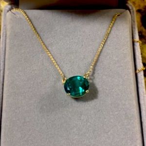 CUSTOM made natural emerald necklace. Set in gold with nice clasp at neck.